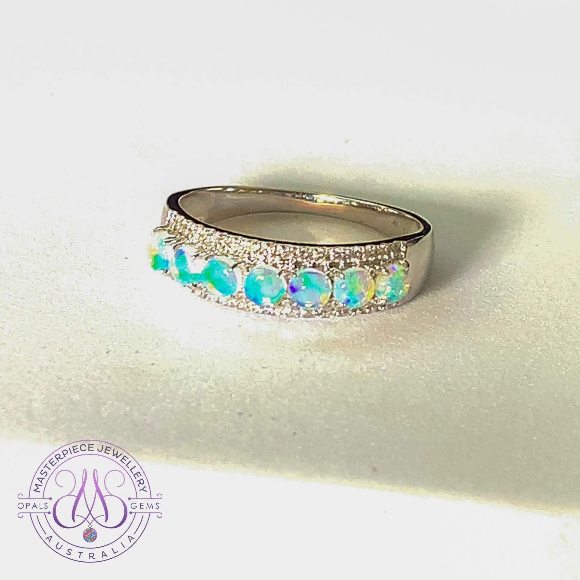 18kt White Gold 3 row Opal and diamond eternity ring design