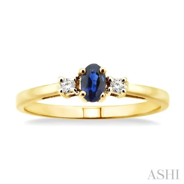 5x3mm Oval Cut Sapphire and 1/20 Ctw Round Cut Diamond Ring in 10K Yellow Gold