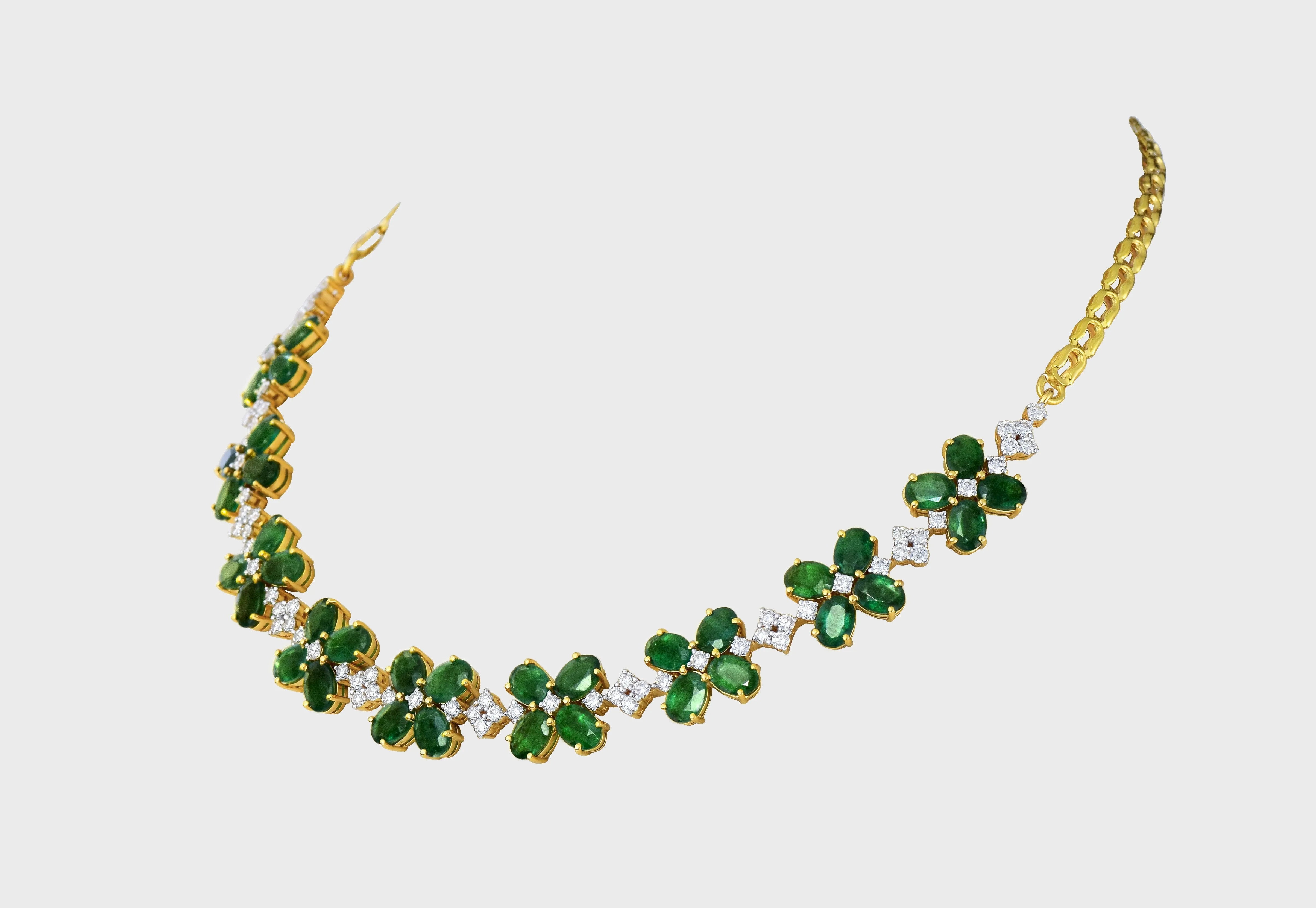 Our exquisite emerald and diamond necklace paired perfectly with luxurious tops, adding a touch of sophistication to any look.(GDNE0489)