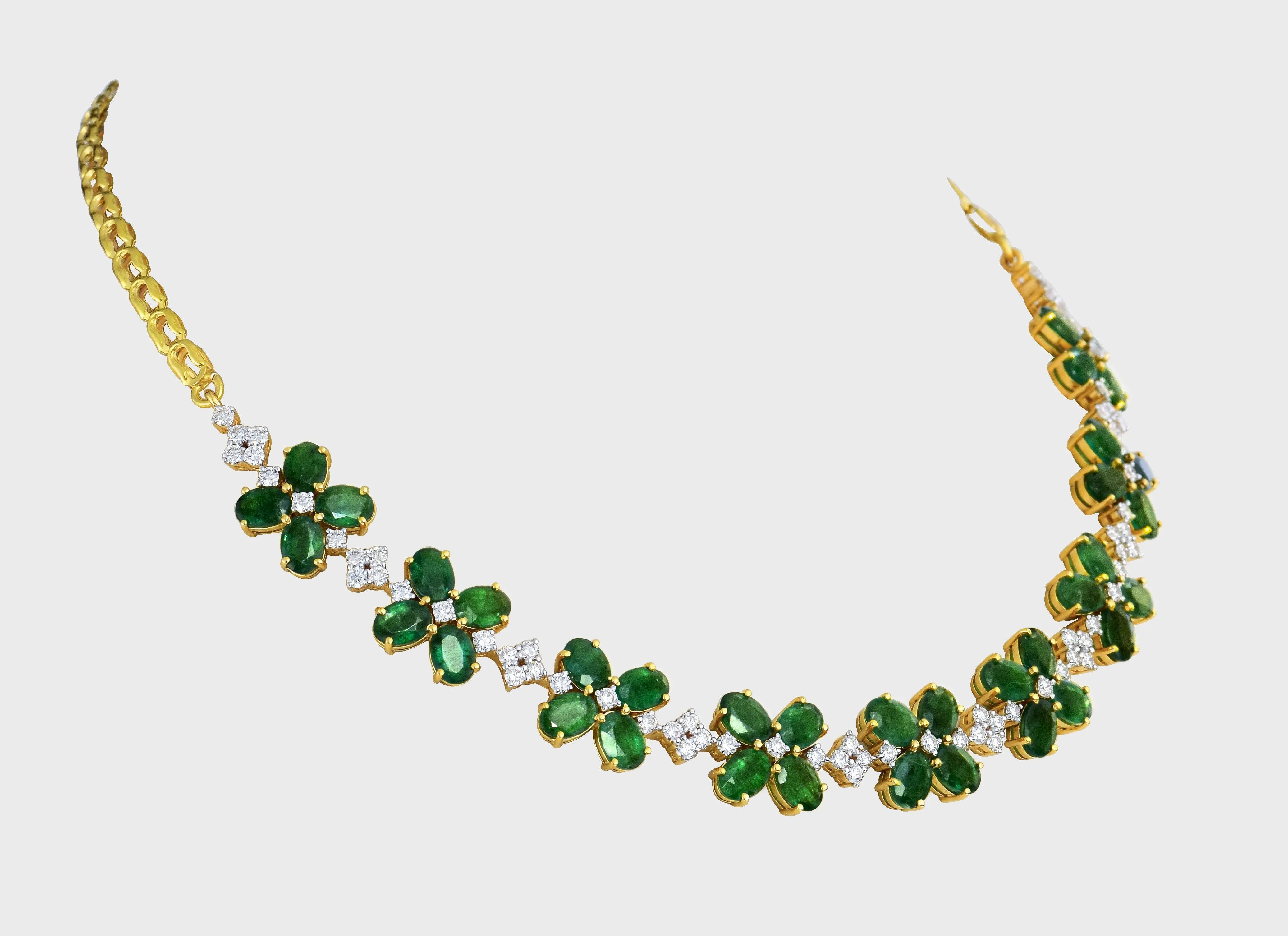 Our exquisite emerald and diamond necklace paired perfectly with luxurious tops, adding a touch of sophistication to any look.(GDNE0489)