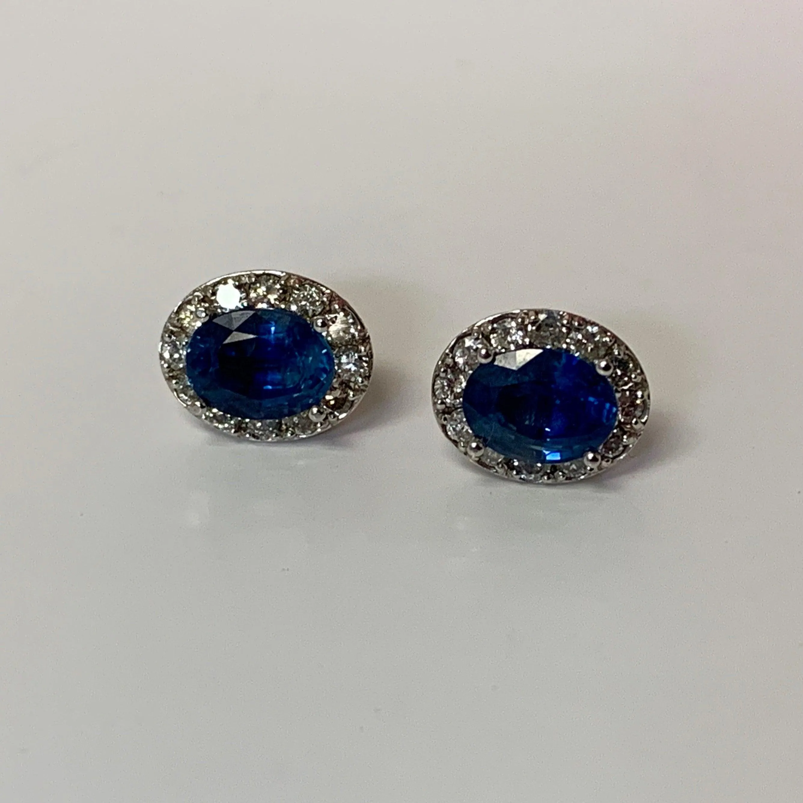 Oval Sapphire Diamond Halo Stud Earrings White Gold